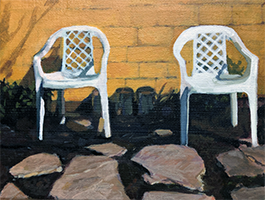 2 white lawn chairs